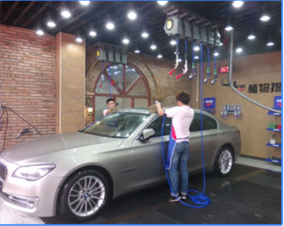 某4S店用自动伸缩水管方案大大提高了工作效率